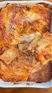 BAKED PACCHERI RECIPE WITH MEAT SAUCE, RICOTTA MOZZARELLA AND PARMIGIANO